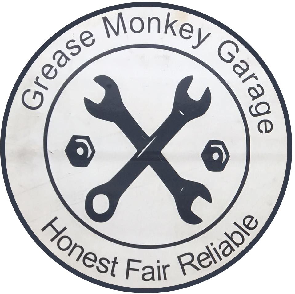 Grease Monkey Garage Towing And Recovery Logo